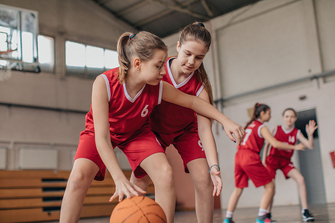 Girls playing basketball